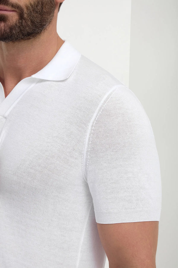 White Polo, men's white short-sleeve polo shirt, elegant breathable polo, refined casual wear, lightweight and comfortable, polo blanc pour hommes, polo respirant et raffiné, polo estival élégant, polo bianco, maglia traspirante e sofisticata, abbigliamento casual di classe.