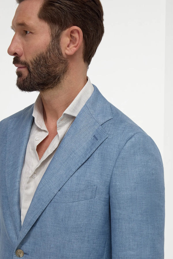 Light Blue Linen Jacket, men's light blue blazer, elegant linen jacket, breathable summer jacket, casual yet refined blazer, veste en lin bleu clair pour hommes, veste élégante en lin, veste respirante d'été, giacca azzurro chiaro in lino, giacca elegante estiva, blazer traspirante in lino.