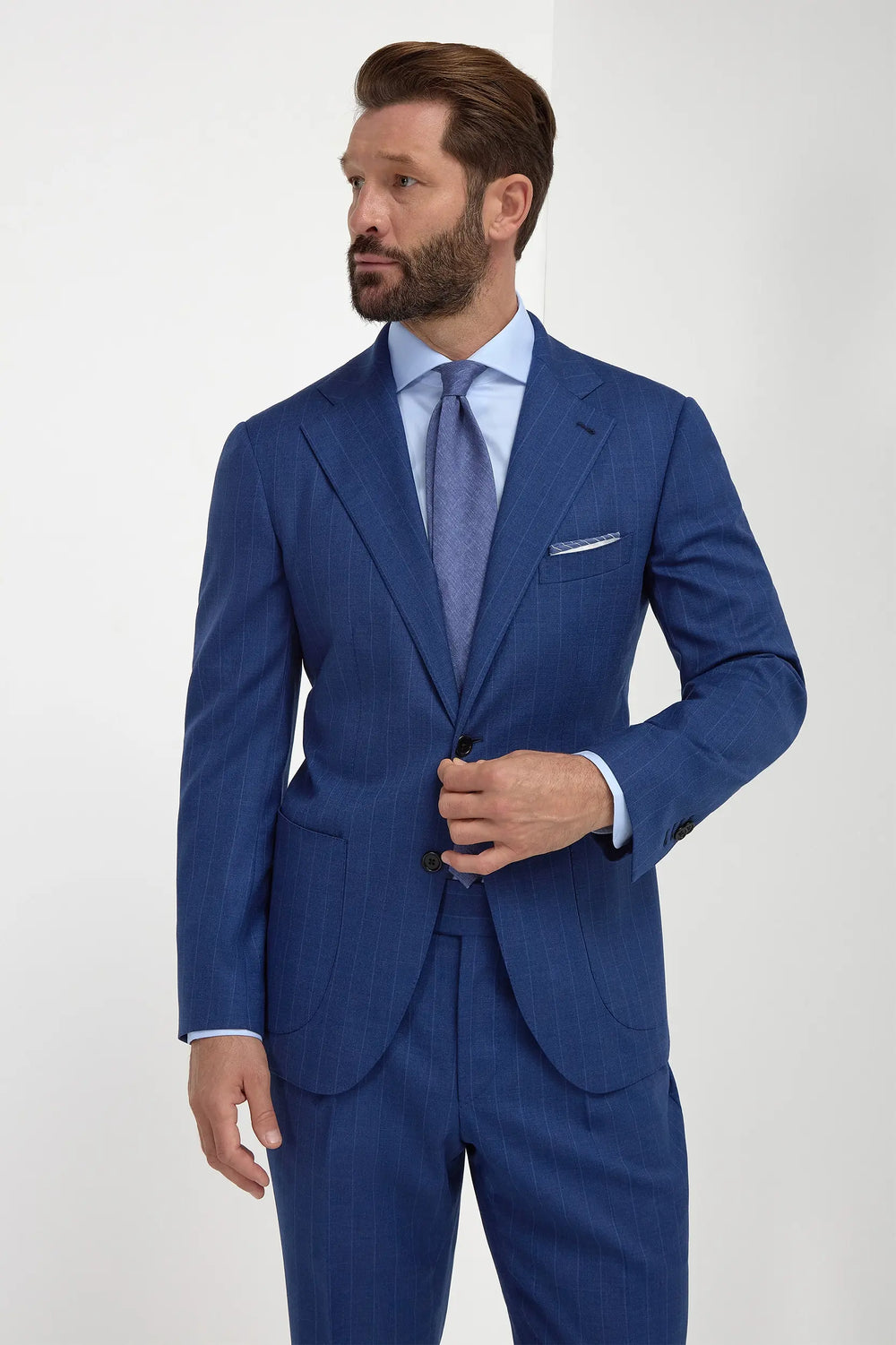 Royal Blue Striped Suit, men's royal blue pinstripe suit, elegant tailored suit, formal striped wool suit, breathable business suit, costume bleu royal à rayures pour hommes, costume élégant en laine, costume formel respirant, abito blu royal gessato, abito elegante sartoriale, completo formale in lana.