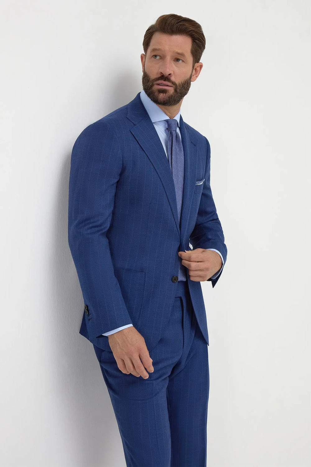 Royal Blue Striped Suit, men's royal blue pinstripe suit, elegant tailored suit, formal striped wool suit, breathable business suit, costume bleu royal à rayures pour hommes, costume élégant en laine, costume formel respirant, abito blu royal gessato, abito elegante sartoriale, completo formale in lana.