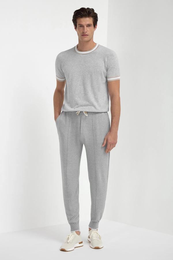 Sky Grey Cashmere Blend Jogger Pants, men's light grey cashmere joggers, elegant soft knit trousers, breathable lightweight loungewear, refined casual comfort, pantalon de jogging en mélange de cachemire gris ciel pour hommes, pantalon léger et respirant, bas de survêtement raffiné, pantaloni jogger in misto cashmere grigio cielo, pantaloni morbidi e traspiranti, abbigliamento casual elegante.