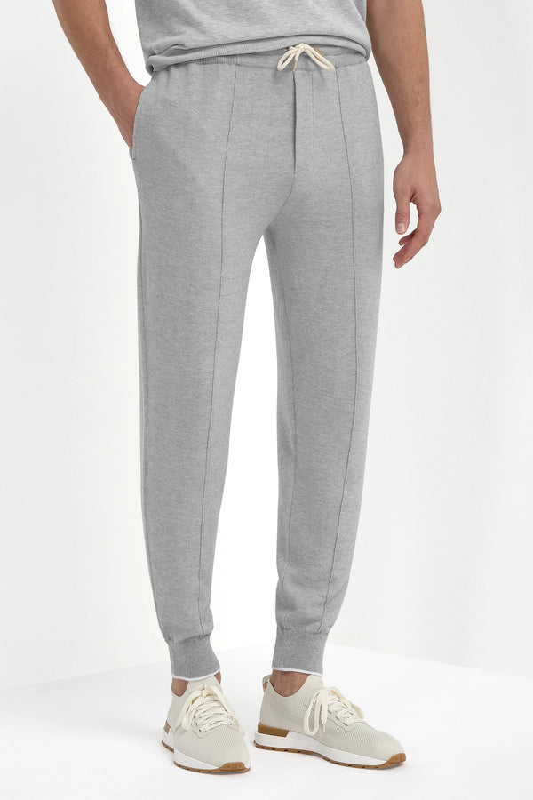 Sky Grey Cashmere Blend Jogger Pants, men's light grey cashmere joggers, elegant soft knit trousers, breathable lightweight loungewear, refined casual comfort, pantalon de jogging en mélange de cachemire gris ciel pour hommes, pantalon léger et respirant, bas de survêtement raffiné, pantaloni jogger in misto cashmere grigio cielo, pantaloni morbidi e traspiranti, abbigliamento casual elegante.