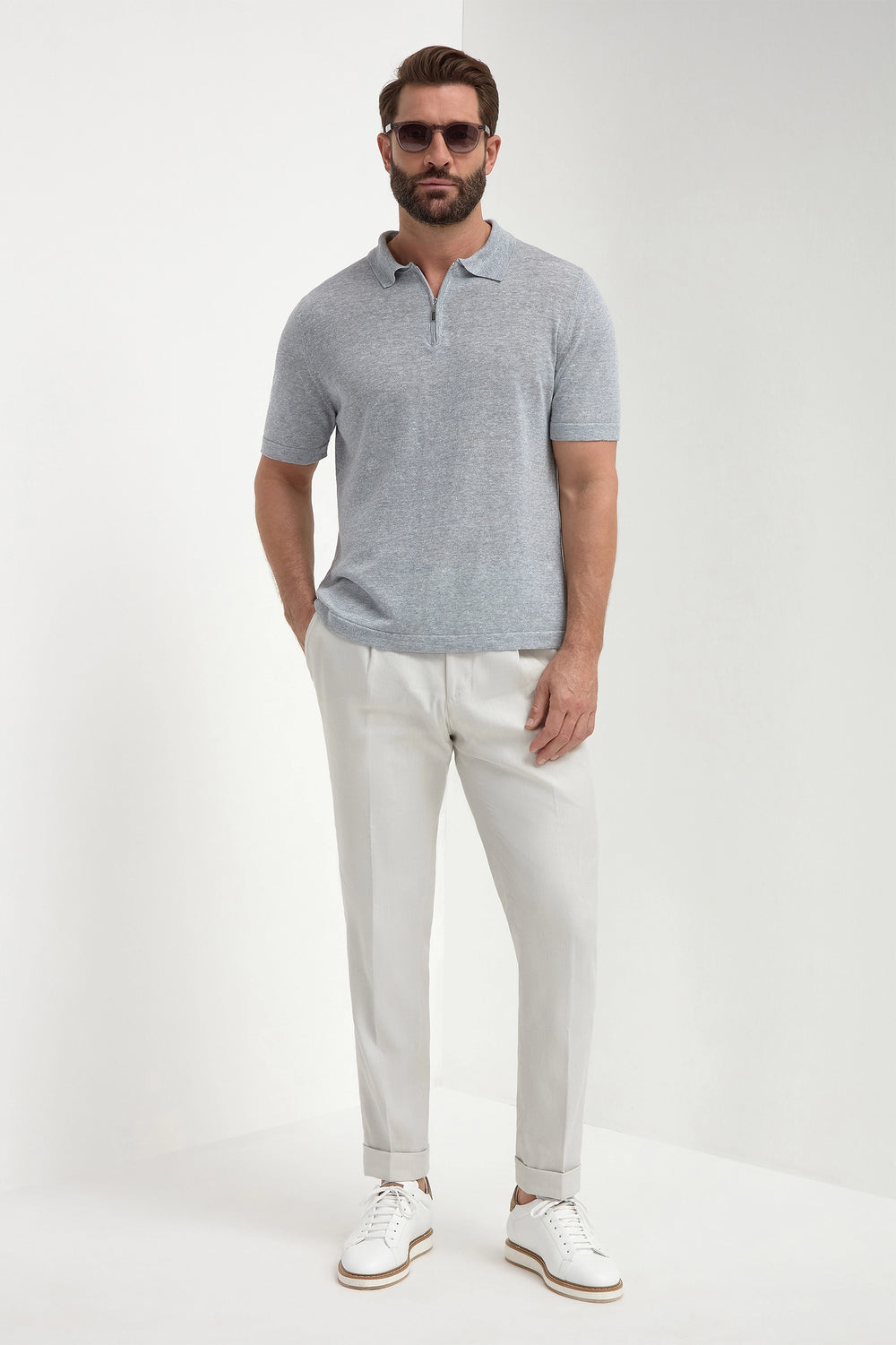 Sky Grey Linen and Cotton Zipped Polo, men's light grey zip polo, elegant breathable polo, lightweight summer knitwear, refined casual wear, polo zippé en lin et coton gris ciel pour hommes, polo léger et respirant, polo estival élégant, polo con zip in lino e cotone grigio cielo, polo traspirante e raffinato, maglia casual elegante.