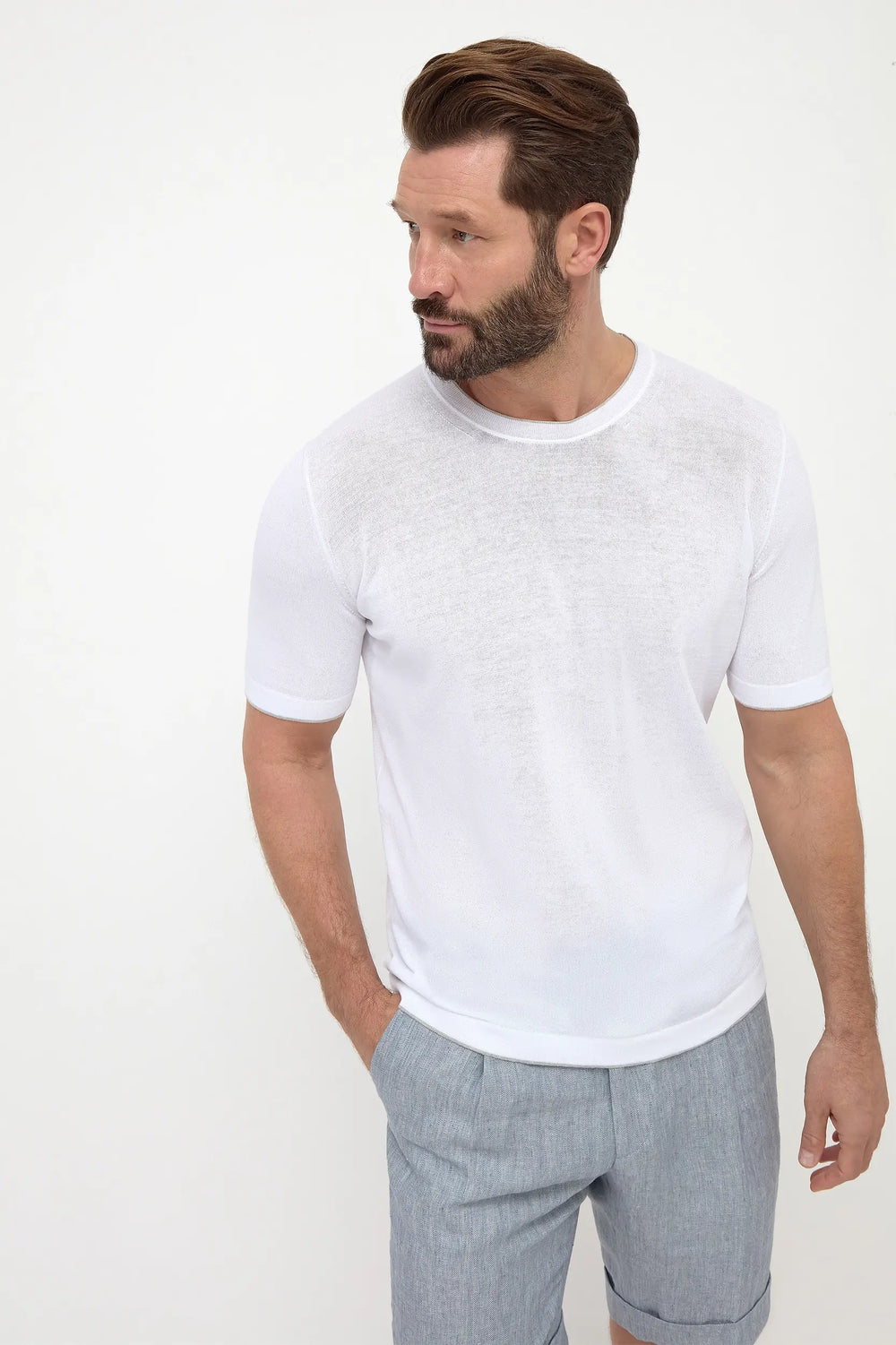 White Knitted T-Shirt, men's white knit tee, elegant lightweight t-shirt, breathable summer knitwear, refined casual wear, t-shirt en maille blanc pour hommes, t-shirt tricoté léger et respirant, t-shirt estival élégant, maglietta in maglia bianca, maglia leggera e traspirante, abbigliamento casual raffinato.